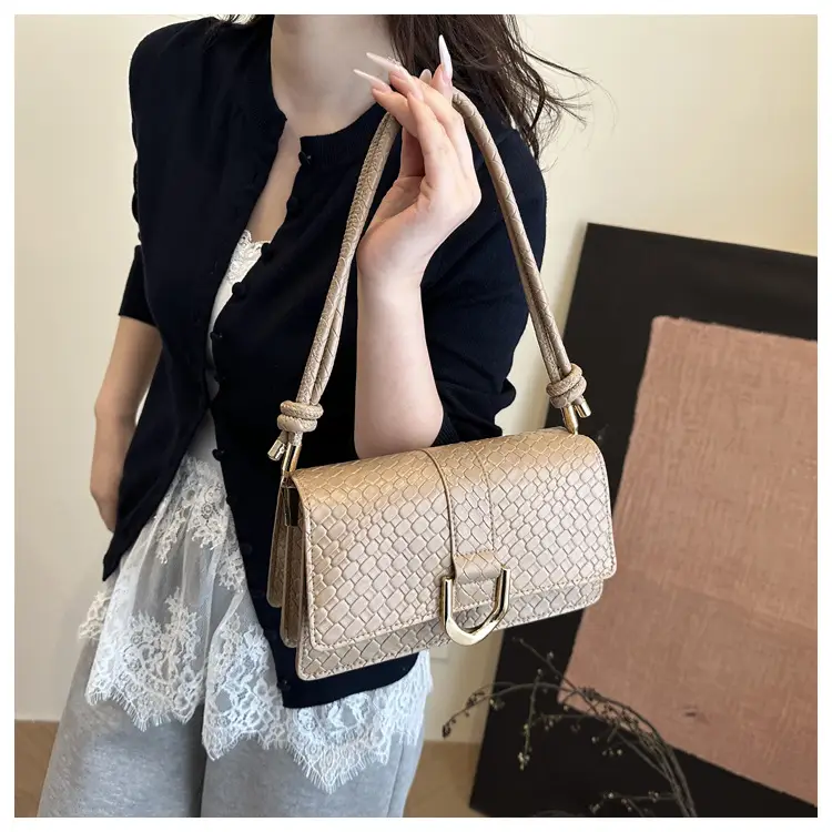 Black Textured Shoulder Bag with Gold Hardware — feature 9