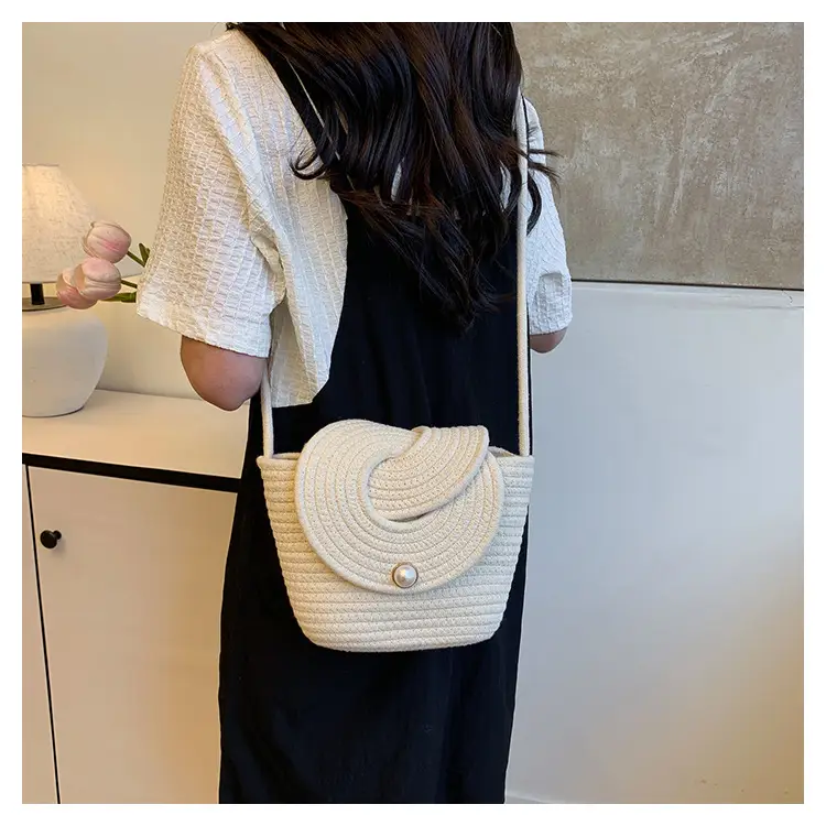 Women's Light Blue Woven Crossbody Bag with Pearl Accents — feature 9