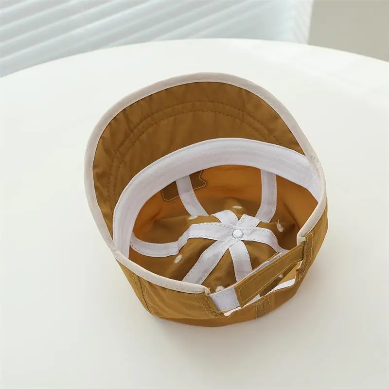 Baby Duck Cap with "SX" Logo Beige Soft Brim Hat — feature 11