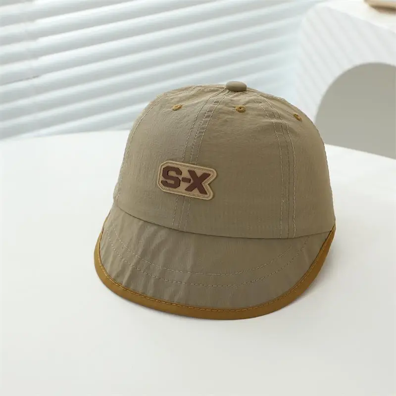 Baby Duck Cap with "SX" Logo Beige Soft Brim Hat — feature 2