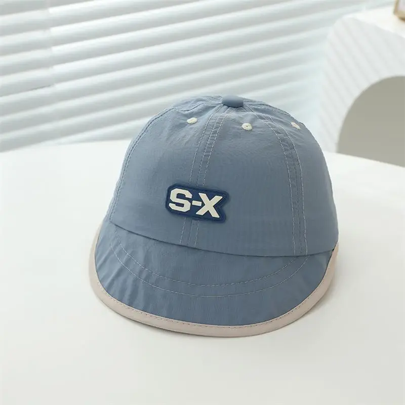 Baby Duck Cap with "SX" Logo Beige Soft Brim Hat — feature 3