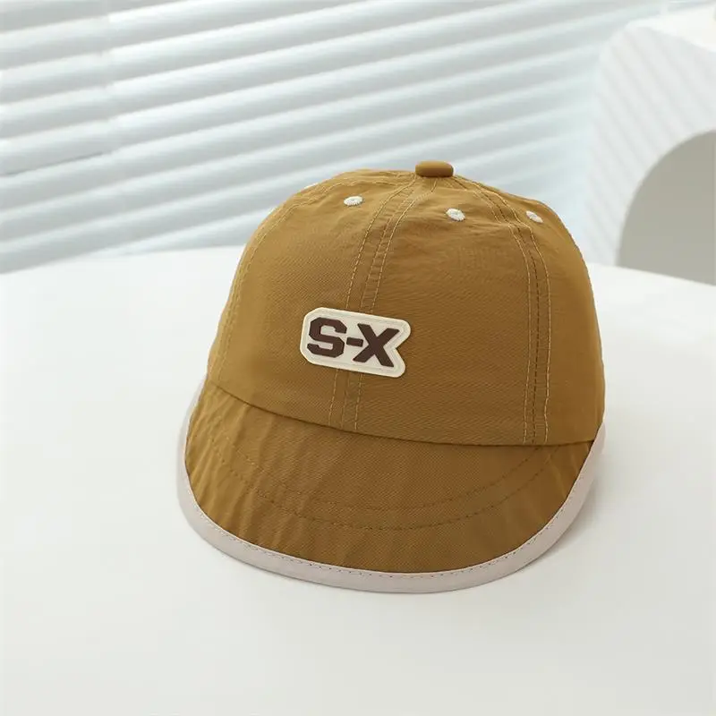 Baby Duck Cap with "SX" Logo Beige Soft Brim Hat — feature 4