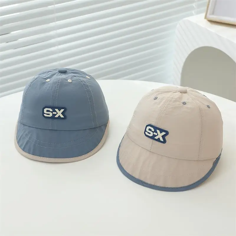 Baby Duck Cap with "SX" Logo Beige Soft Brim Hat — feature 6