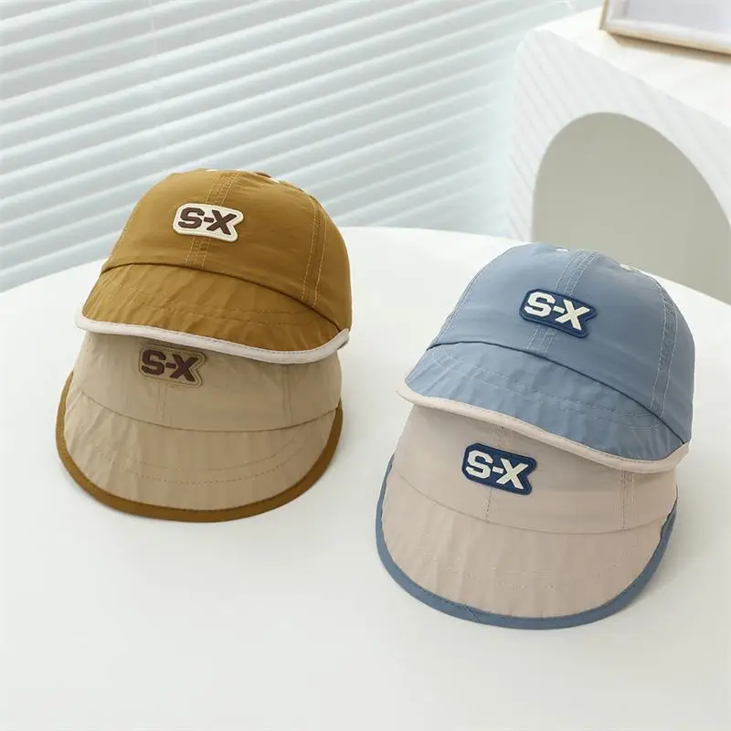 Baby Duck Cap with "SX" Logo Beige Soft Brim Hat — feature 7