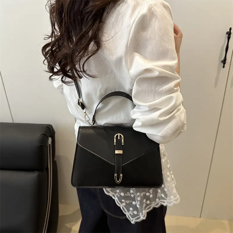 Black Leather Shoulder Bag with Gold Clasp - Image 5