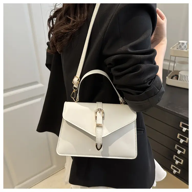 Black Leather Shoulder Bag with Gold Clasp — feature 10
