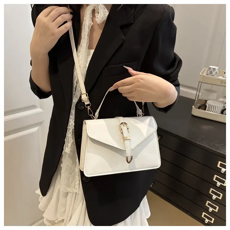 Black Leather Shoulder Bag with Gold Clasp — feature 11