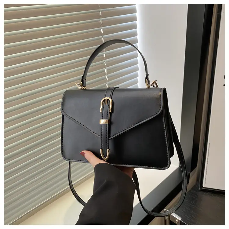 Black Leather Shoulder Bag with Gold Clasp — feature 13