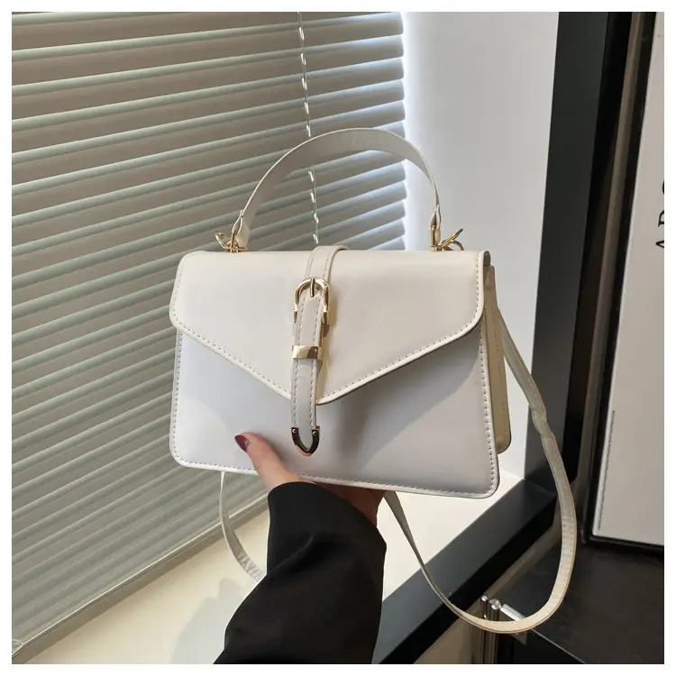 Black Leather Shoulder Bag with Gold Clasp — feature 14