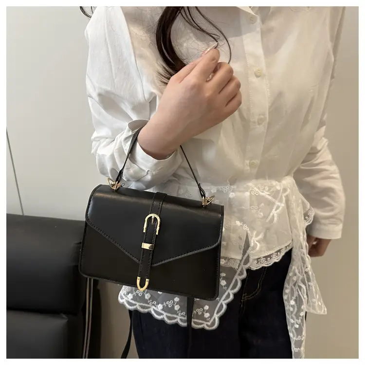 Black Leather Shoulder Bag with Gold Clasp — feature 9