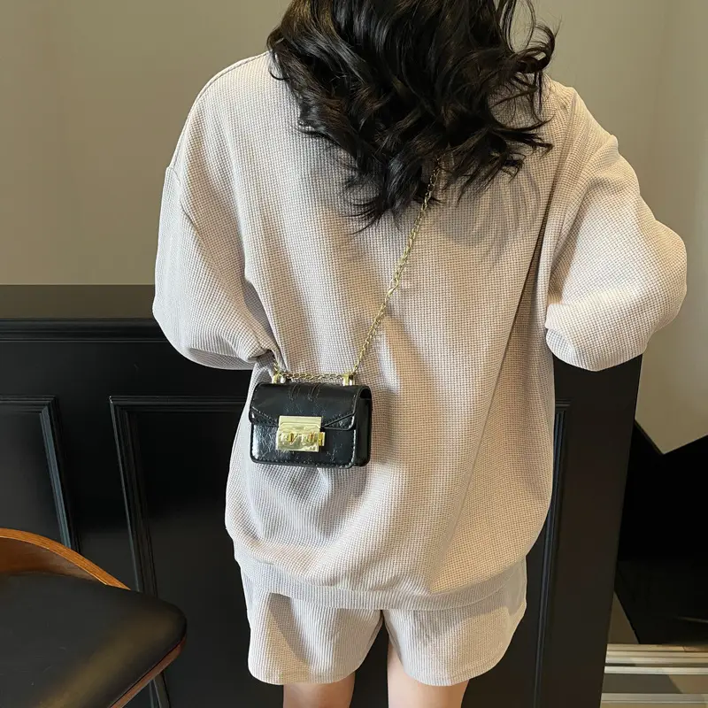 Light Blue Mini Square Crossbody Bag with Gold Clasp - Image 7