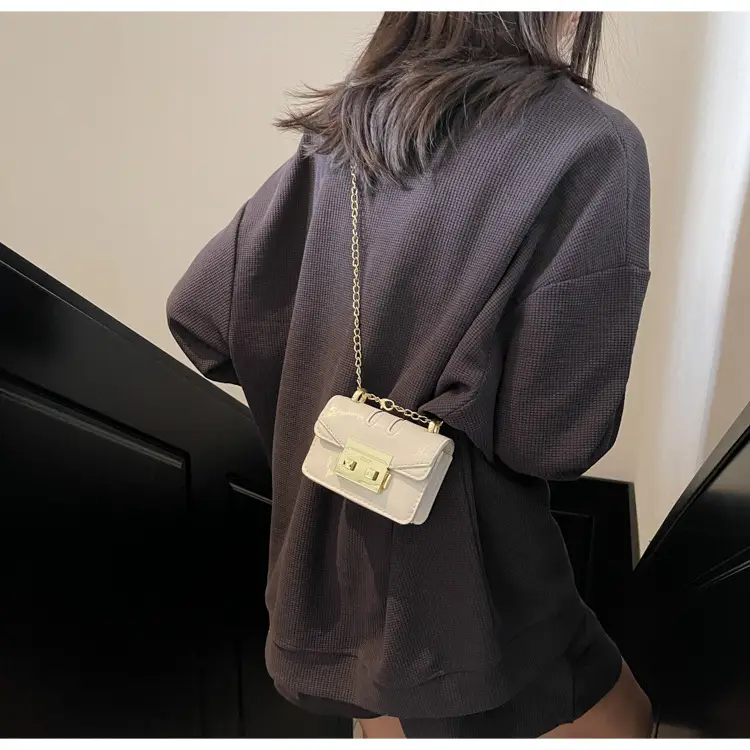 Light Blue Mini Square Crossbody Bag with Gold Clasp — feature 1