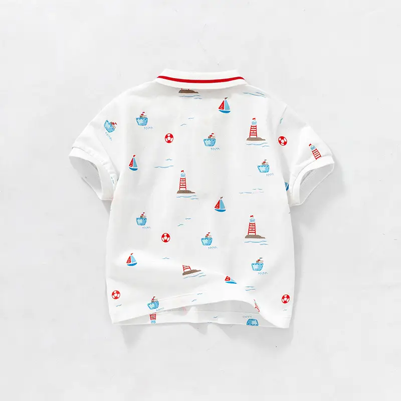 Boys' White Polo T-Shirt with Lighthouse & Sailboat Print - Image 2