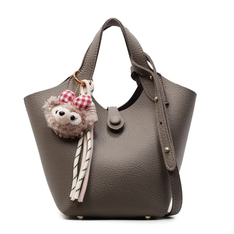Women's Soft Leather Crossbody Bag with Cute Pom Pom Charm - Image 11