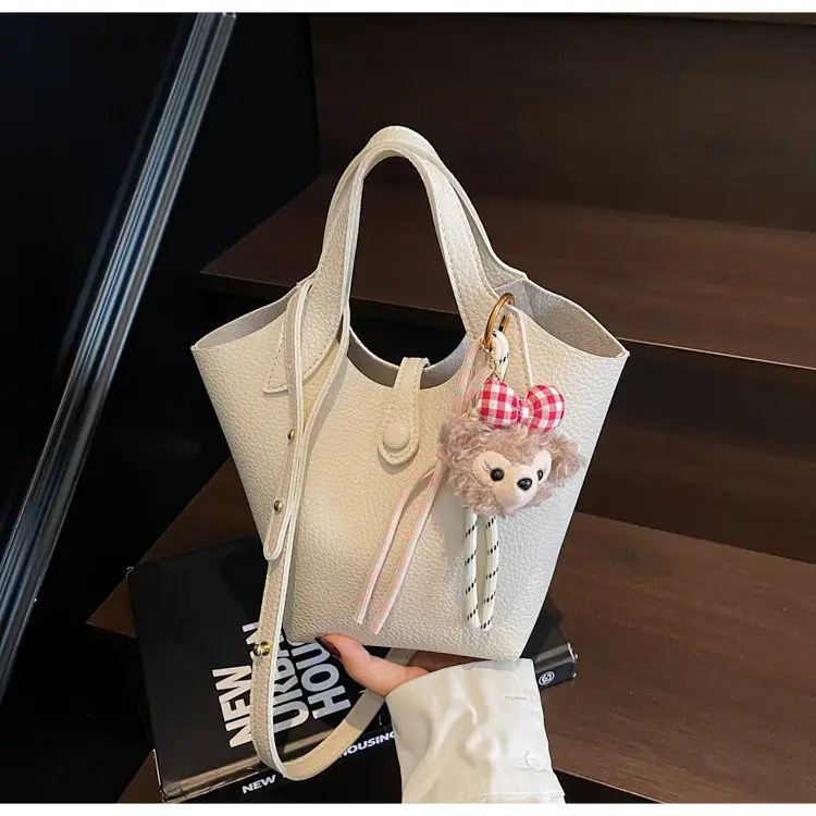 Women's Soft Leather Crossbody Bag with Cute Pom Pom Charm — feature 17