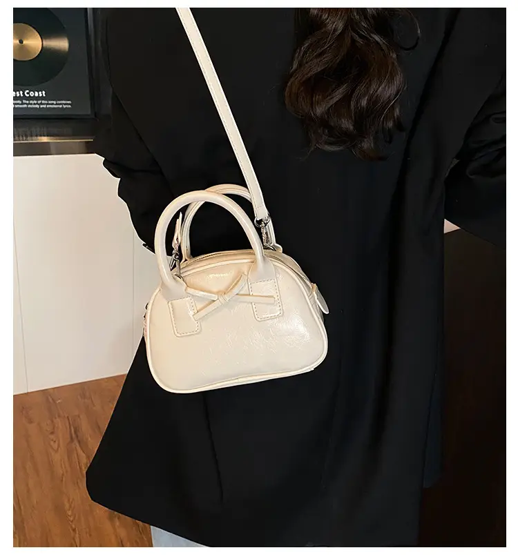 Women's Cream Bow Crossbody Bag 2025 — feature 1