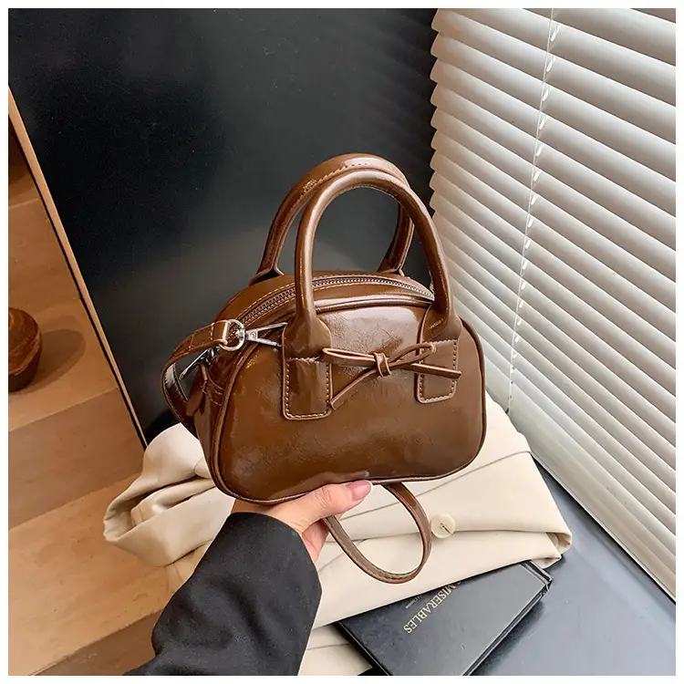 Women's Cream Bow Crossbody Bag 2025 — feature 34