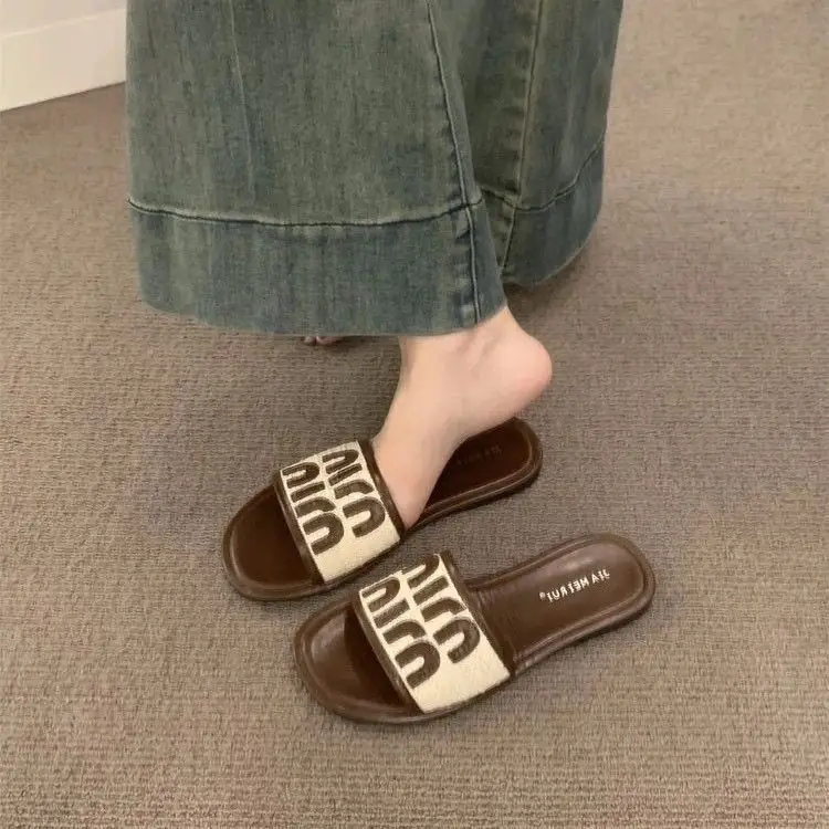 Women's Black Leather Flip Flops with White Stripes 2024 — feature 5