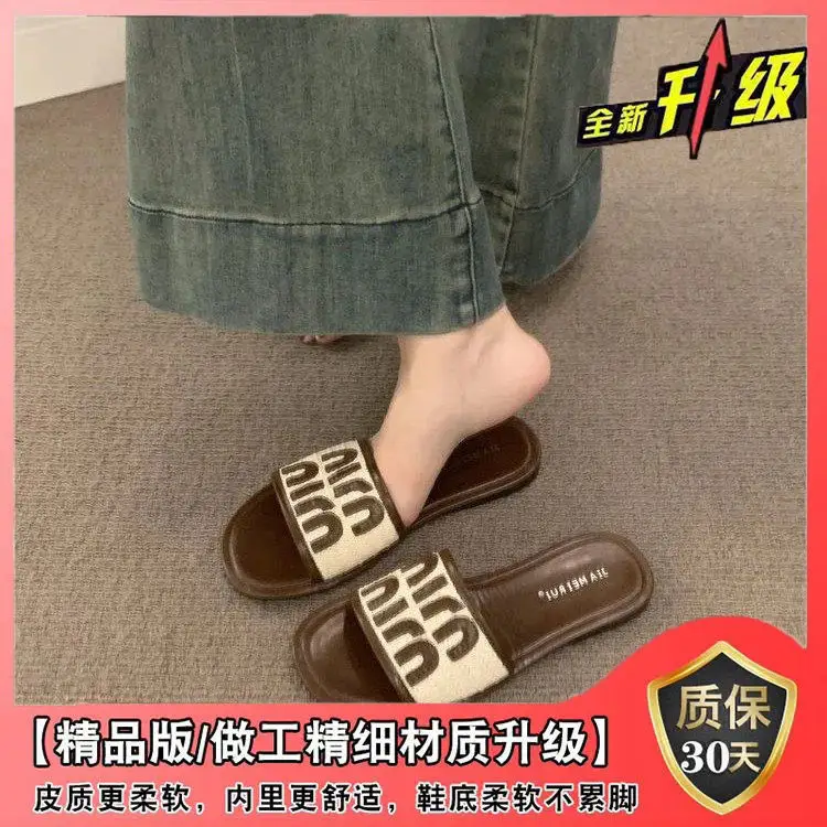 Women's Black Leather Flip Flops with White Stripes 2024