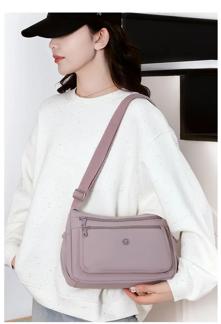 Multi-Compartment Crossbody Bag for Women, Lightweight Nylon Travel Bag — feature 24