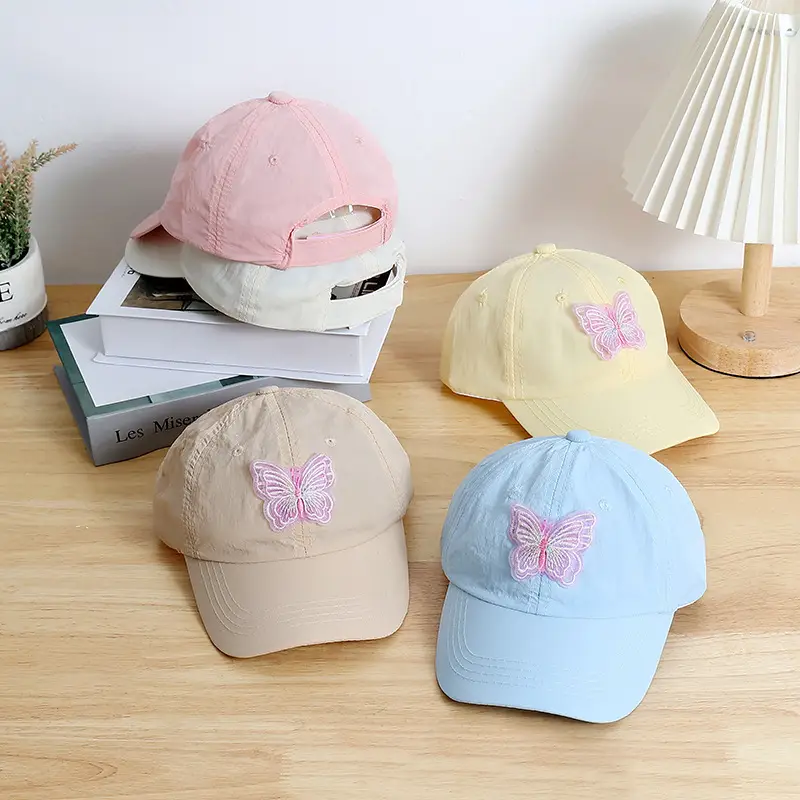 New Kids White Baseball Cap with "M" Logo — feature 2