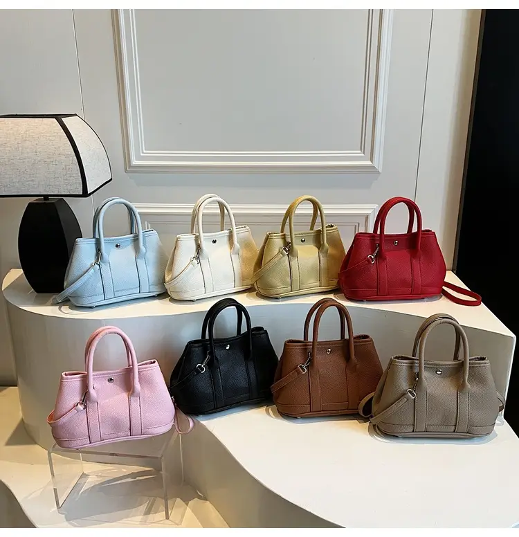 White Leather Hand-Carrying Bucket Bag for Women — feature 1