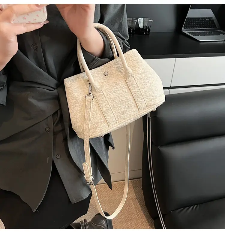White Leather Hand-Carrying Bucket Bag for Women — feature 17