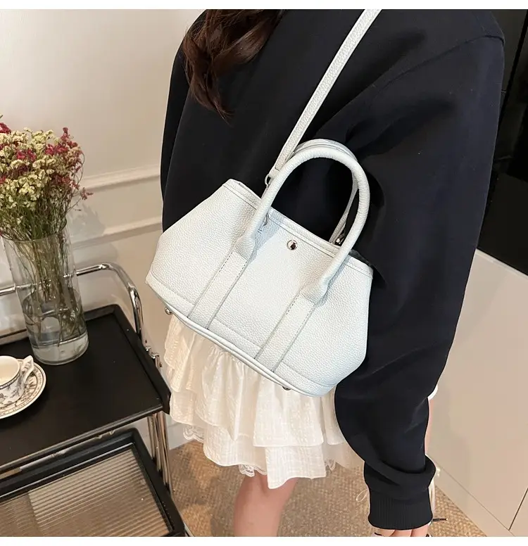 White Leather Hand-Carrying Bucket Bag for Women — feature 18
