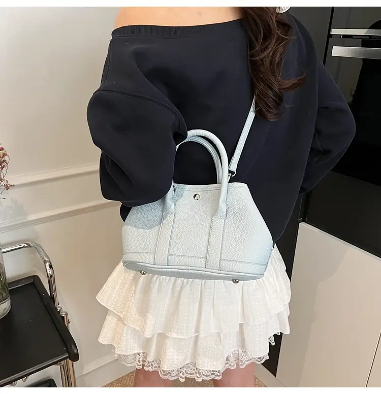 White Leather Hand-Carrying Bucket Bag for Women — feature 19