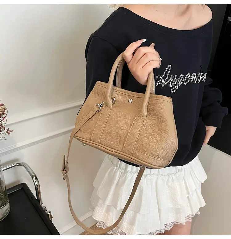 White Leather Hand-Carrying Bucket Bag for Women — feature 24
