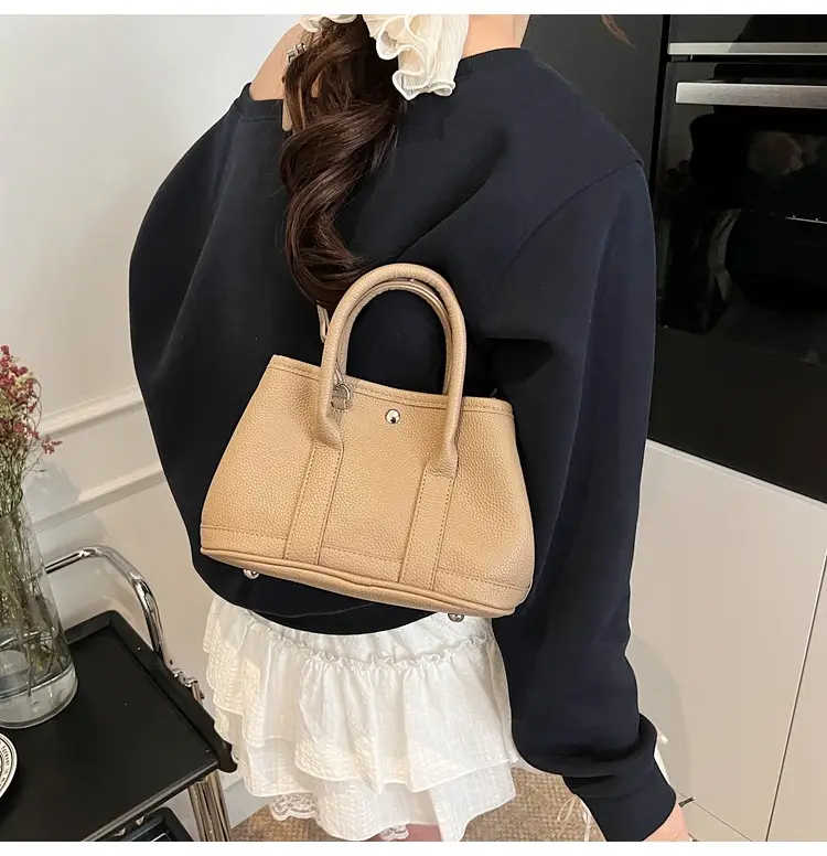 White Leather Hand-Carrying Bucket Bag for Women — feature 26