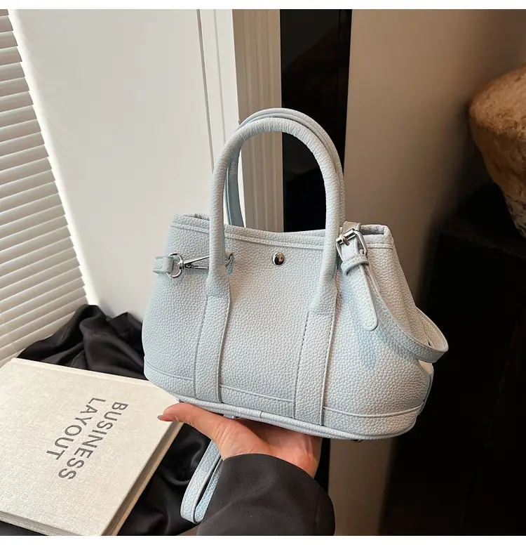 White Leather Hand-Carrying Bucket Bag for Women — feature 38