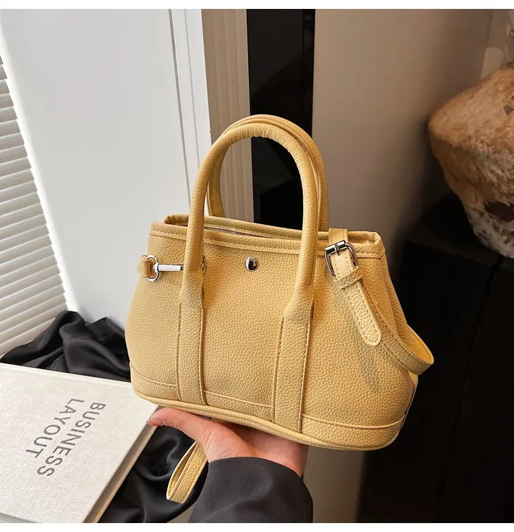 White Leather Hand-Carrying Bucket Bag for Women — feature 40