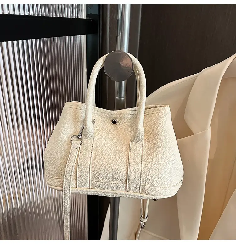 White Leather Hand-Carrying Bucket Bag for Women — feature 44