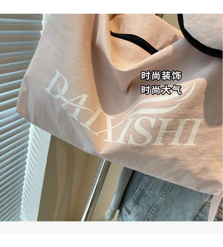 Large Capacity Canvas Tote Bag with Orange Logo — feature 27