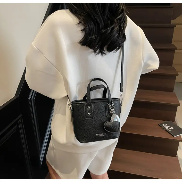 Women's Yellow Leather Bucket Bag with Shoulder Crossbody Strap — feature 24