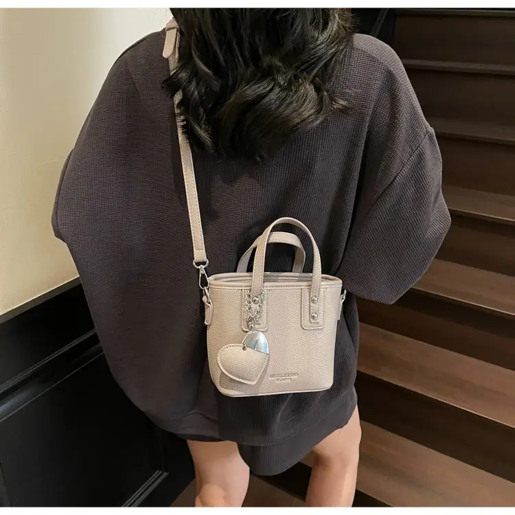 Women's Yellow Leather Bucket Bag with Shoulder Crossbody Strap — feature 25
