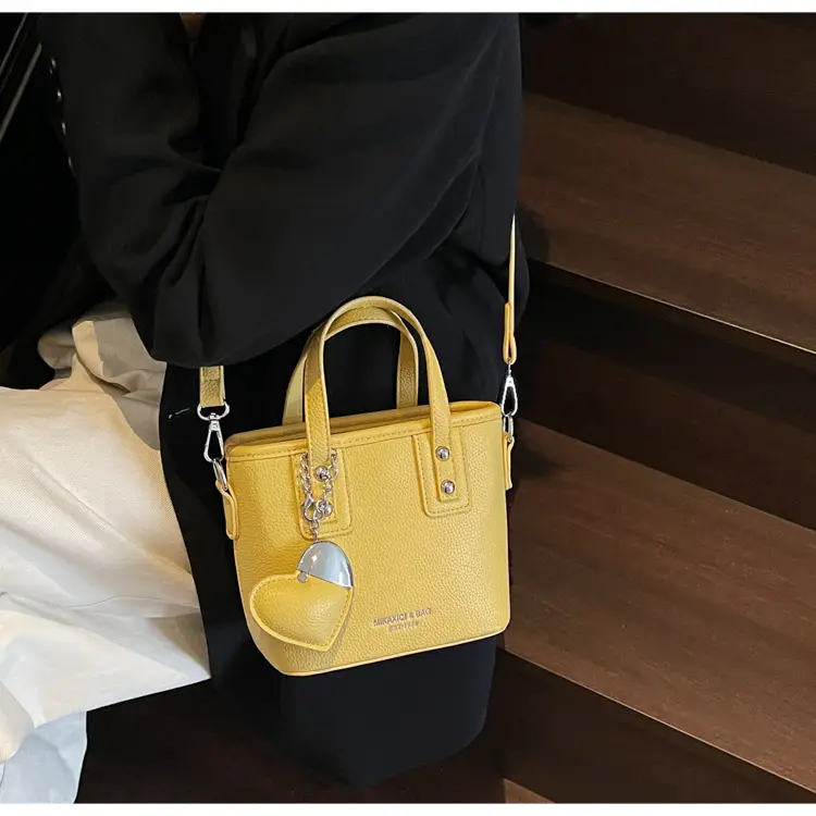 Women's Yellow Leather Bucket Bag with Shoulder Crossbody Strap — feature 29