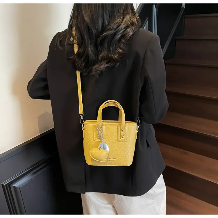 Women's Yellow Leather Bucket Bag with Shoulder Crossbody Strap — feature 30