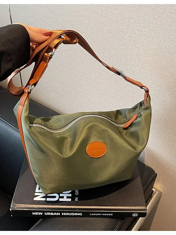 Green Crossbody Bag with Orange Handle & Leather Strap