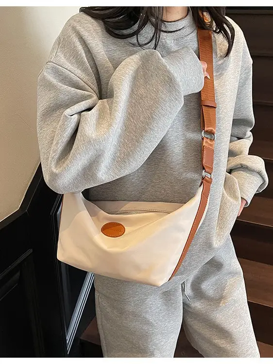 Green Crossbody Bag with Orange Handle & Leather Strap