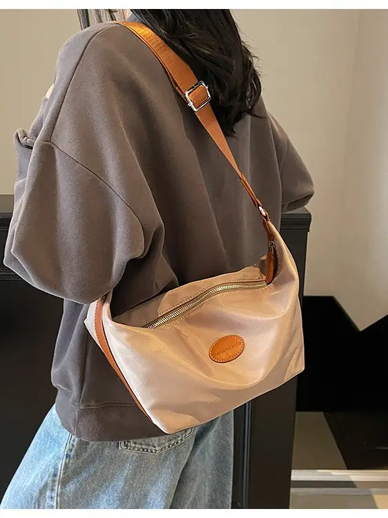 Green Crossbody Bag with Orange Handle & Leather Strap