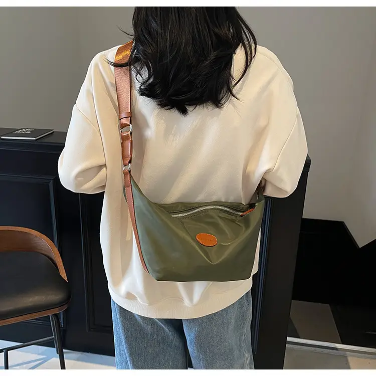 Green Crossbody Bag with Orange Handle & Leather Strap — feature 26