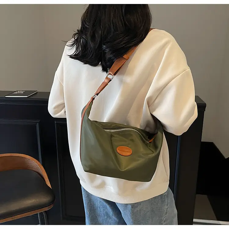 Green Crossbody Bag with Orange Handle & Leather Strap — feature 28