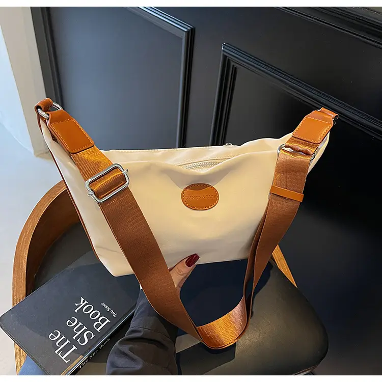 Green Crossbody Bag with Orange Handle & Leather Strap