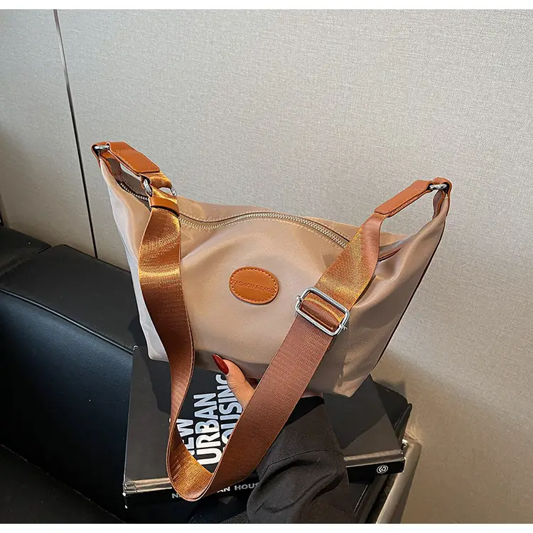 Green Crossbody Bag with Orange Handle & Leather Strap
