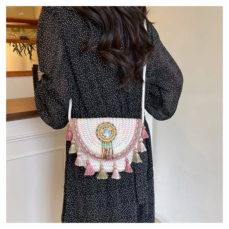Straw Tassel Crossbody Bag with Embroidered Ball — feature 21