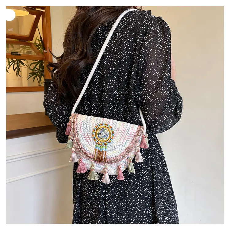 Straw Tassel Crossbody Bag with Embroidered Ball — feature 24
