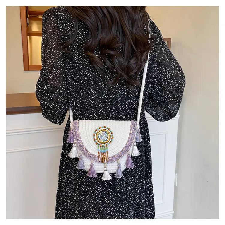 Straw Tassel Crossbody Bag with Embroidered Ball — feature 26