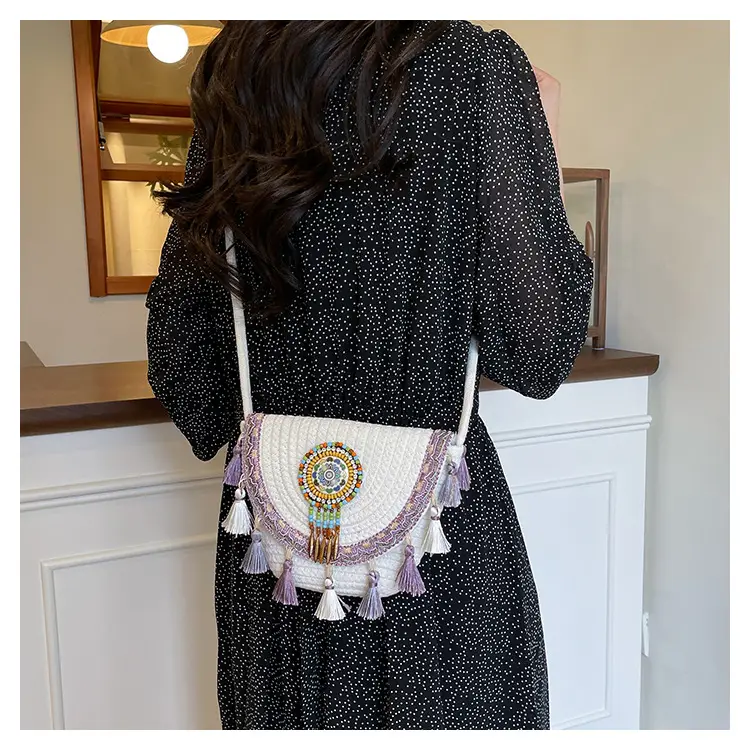 Straw Tassel Crossbody Bag with Embroidered Ball — feature 27
